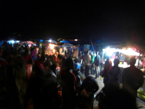 one of the shopping streets at night in the same tent city